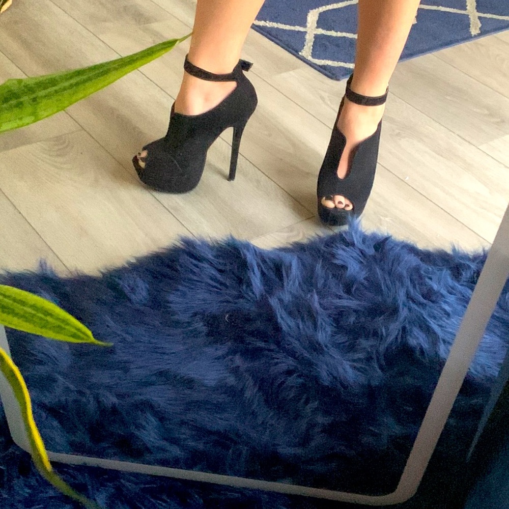 Black peep toe, ankle strap stilettos